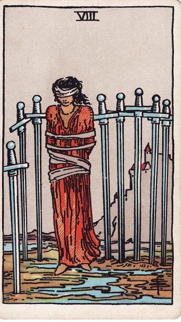 Åtta i Svärd tarotkort Åtta i Svärd tarotkort från Rider Waite Tarotlek, designade av Pamela Colman Smith.