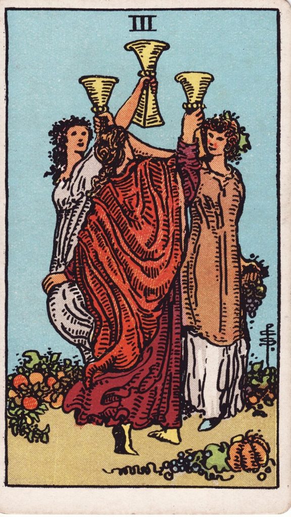Tre i bägare tarotkort Tre i bägare tarotkort från Rider Waite Tarotlek, designade av Pamela Colman Smith.